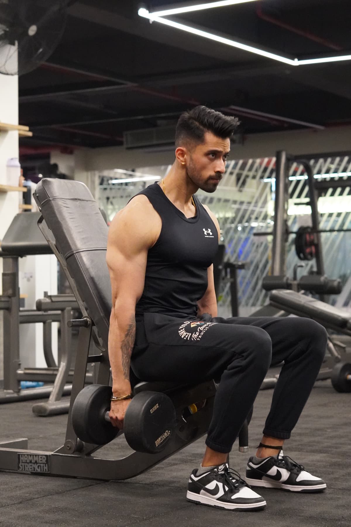 Siddharth strength training with dumbbells